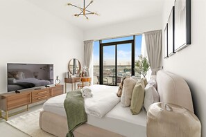 Iron/ironing board, travel crib, WiFi, bed sheets