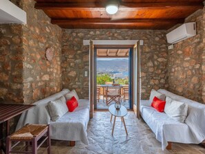 Ferienhaus, eingeschränkter Meerblick | Wohnbereich