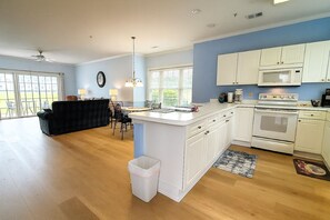 Microwave, dishwasher, coffee/tea maker, cookware/dishes/utensils