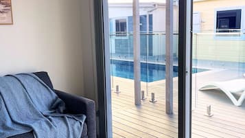 Cabin, Pool View | Living area | 50-inch flat-screen TV with digital channels