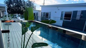 Outdoor pool, open 8:00 AM to 9:00 PM, sun loungers