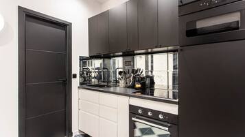 Fridge, microwave, toaster, cookware/dishes/utensils