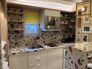 Fridge, microwave, coffee/tea maker, electric kettle