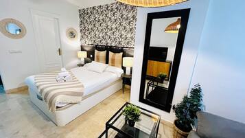 Departamento clásico, 1 cama Queen size | Espacio para trabajar con laptop y wifi gratis