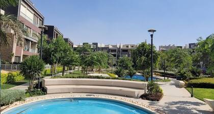 3-bedroom apartment in midtown new cairo compound with WiFi, AC