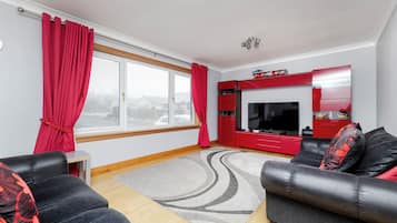 Standard House | Living area | 30-inch LED TV with cable channels