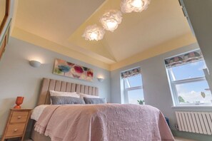 4 bedrooms, desk, iron/ironing board, travel crib