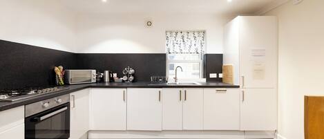 Family Apartment, City View | Iron/ironing board, free WiFi, bed sheets