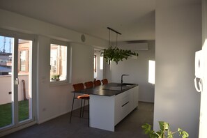 Deluxe Apartment, Sea View | Private kitchen | Espresso maker, electric kettle