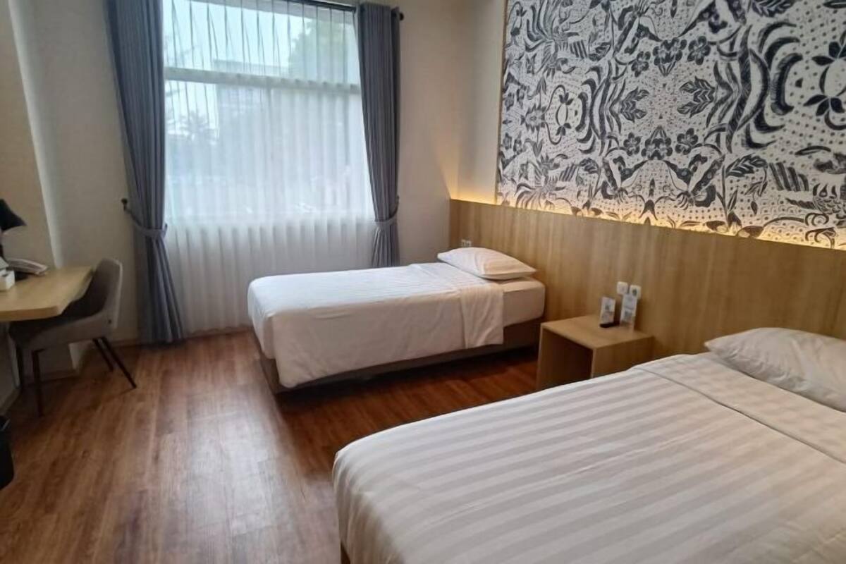 Blackout drapes, iron/ironing board (on request), WiFi (free)