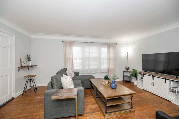 Curl up in the chic living room & stream your favorites on the smart TV