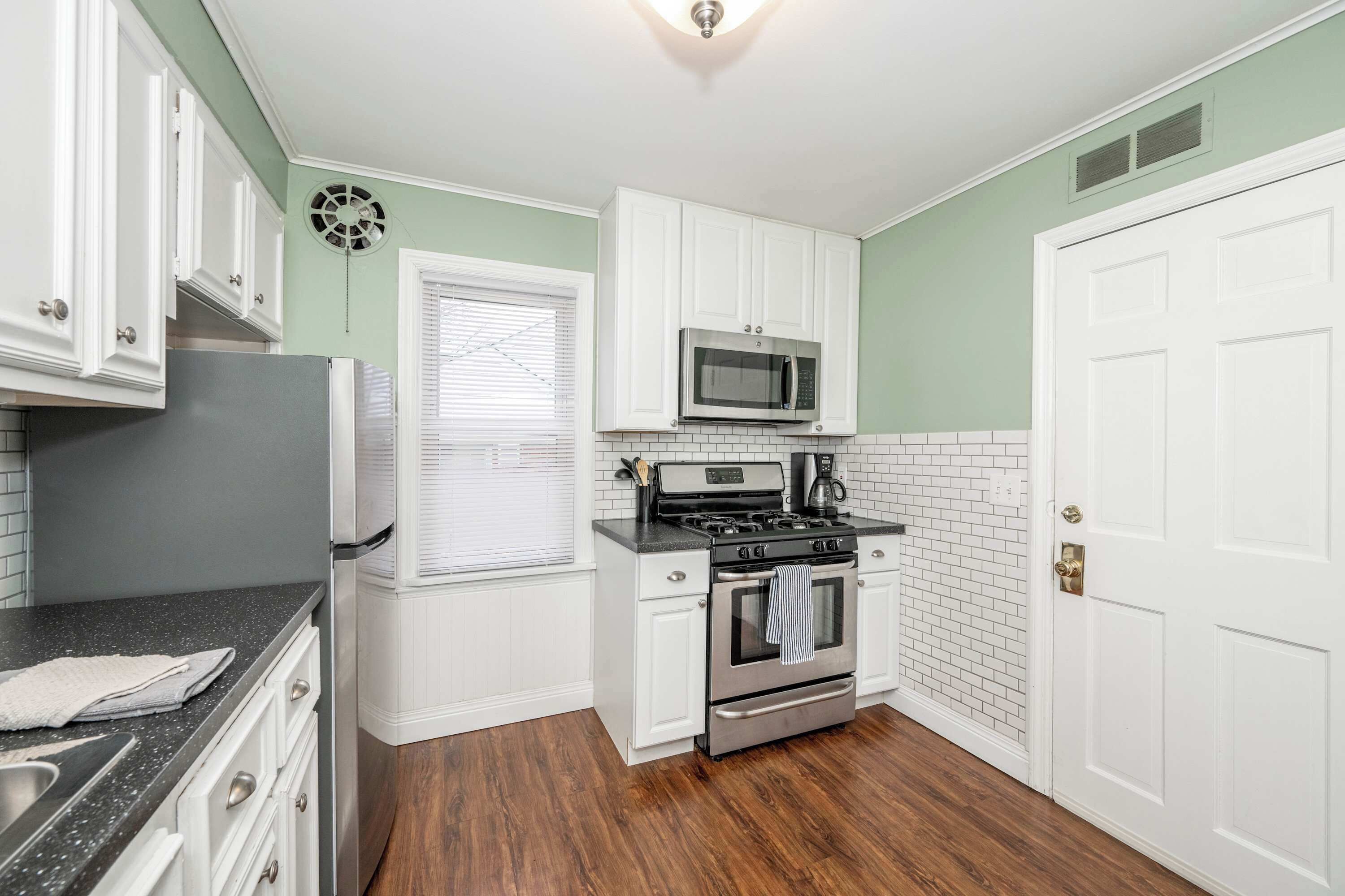 Fridge, microwave, stovetop, coffee/tea maker
