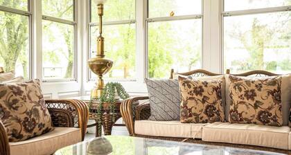 Farmhouse with Heated Pool on almost 160 Acres!