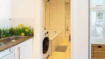 Hair dryer, towels, soap, toilet paper