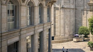 A historic building with classical architecture, including a dome and arched windows. - dHomes -Apartments Rooms- Galleria Gold  (Milan)