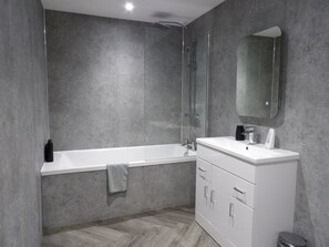 Hair dryer, towels, soap, toilet paper