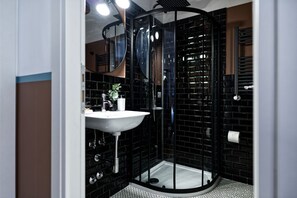 Shower, eco-friendly toiletries, hair dryer, bidet