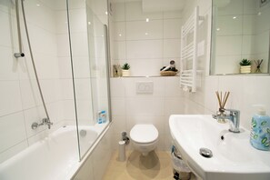 Shower, hair dryer, towels, soap
