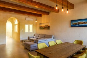 Family Villa, 4 Bedrooms (Solaris Gozitan Villa With Pool Gozo) | Living area | 21-inch flat-screen TV with cable channels, fireplace