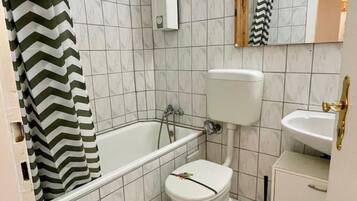 Hair dryer, towels, soap, toilet paper