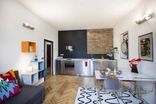 River view living room with kitchen and fold out extra bed