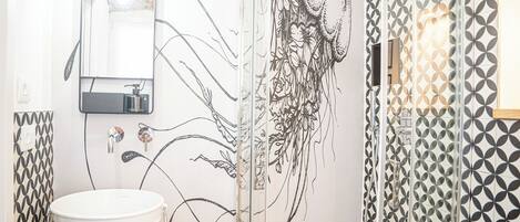 Shower, jetted tub, hair dryer, bidet