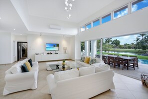 Deluxe Villa, Patio, Lake View | Living area | 55-inch plasma TV with cable channels - Lake View Cocotal Villa - Jacuzzi &Pool  (Punta Cana)