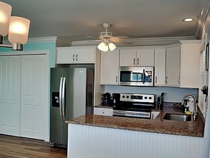 Fridge, microwave, oven, stovetop - Noon Wave | New Furnishings, Close to Beach, Bridge + Dining (Fort Myers Beach)