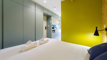 1 dormitorio, tabla de planchar con plancha, Internet y ropa de cama