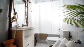 Hair dryer, bidet, towels, soap
