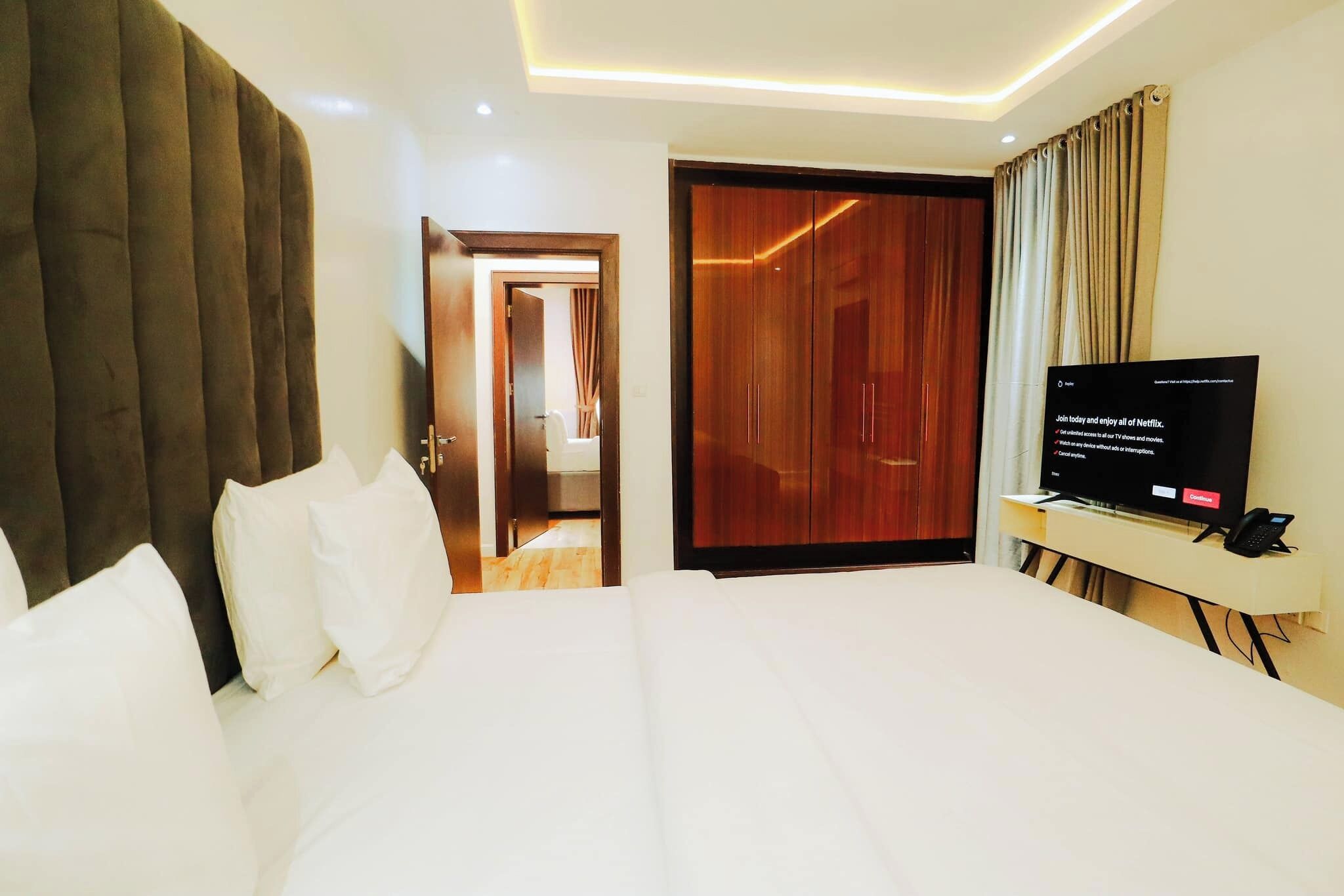 Deluxe Apartment, Balcony, City View | 1 bedroom, desk, laptop workspace, blackout drapes