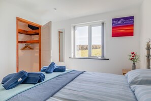 1 dormitorio, tabla de planchar con plancha, wifi gratis y ropa de cama
