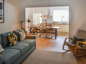TV, fireplace - Escape to our stylish, dog-friendly holiday home in Amble. (Amble)