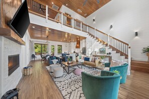 Smart TV, fireplace, foosball, books