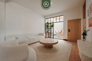 Design Apartment, City View | Living area | TV
