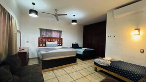 Family Room | In-room safe, iron/ironing board, free WiFi - Hotel Colonos Los Cabos (Cabo San Lucas)