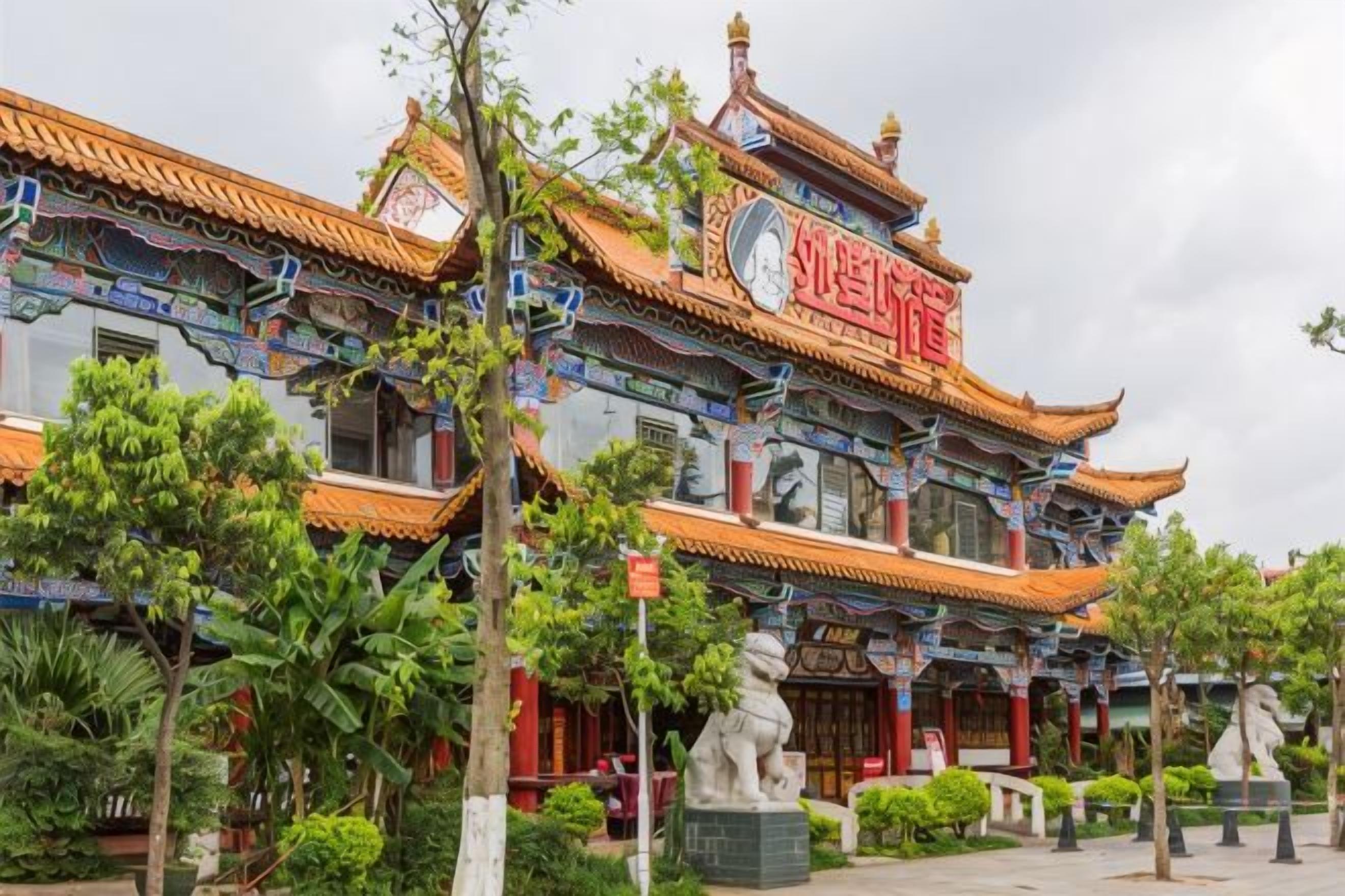 A traditional Chinese building with ornate architecture, including multiple eaves and a prominent red sign.