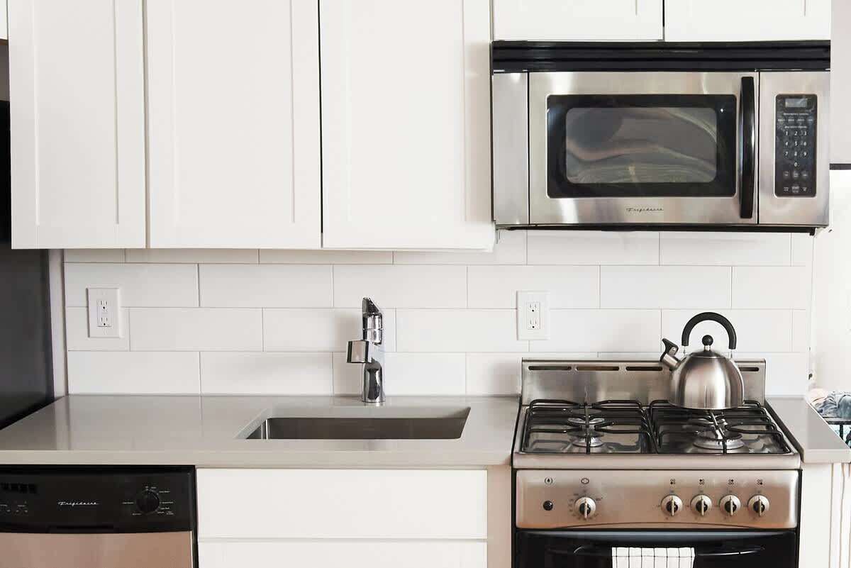 Fridge, coffee/tea maker, cookware/dishes/utensils