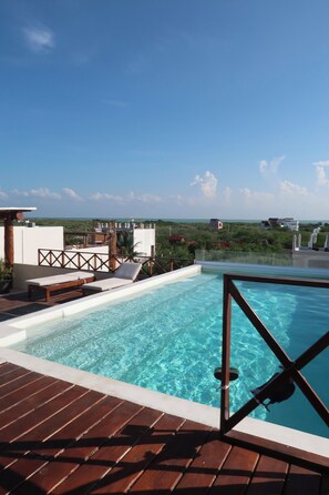 Outdoor pool, open 8:30 AM to 8:00 PM, sun loungers