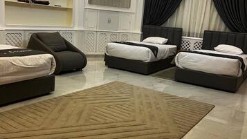 Deluxe Quadruple Room | 1 bedroom, Egyptian cotton sheets, premium bedding, down duvets