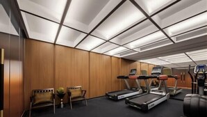 A gym with treadmills, stationary bikes, and a bench. - Bolianhui Hotel (Chongqing Southwest Hospital) (Chongqing)