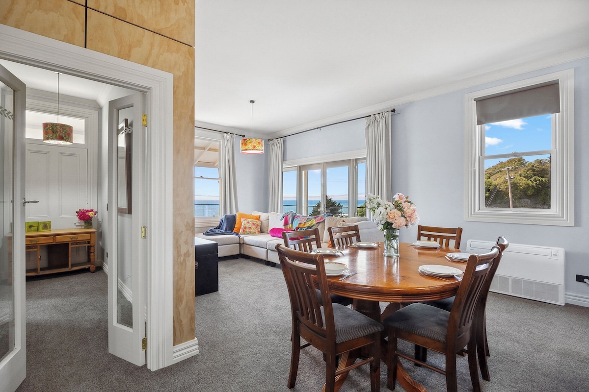Open-plan dining and living area at Moeraki Beach Haven