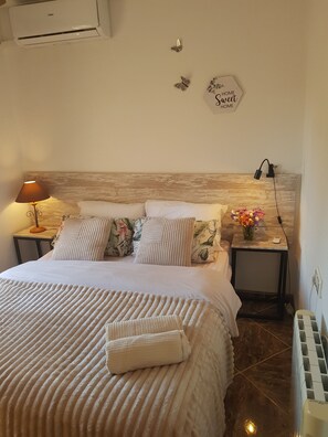 2 slaapkamers, een strijkplank/strijkijzer, wifi, beddengoed