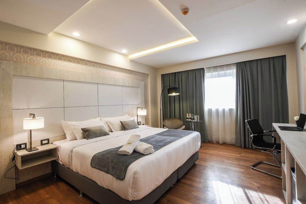 Superior Room, City View | Down comforters, minibar, in-room safe, laptop workspace