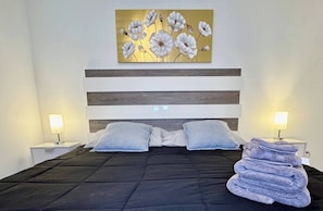 2 bedrooms, desk, iron/ironing board, travel crib