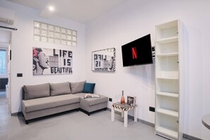 Apartment, 1 Bedroom, City View | Living room | Books - Vatican - Jubilee, Domus St Peter Wi-fi A-C (Rome)
