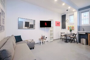 Apartment, 1 Bedroom, City View | Living room | Books - Vatican - Jubilee, Domus St Peter Wi-fi A-C (Rome)