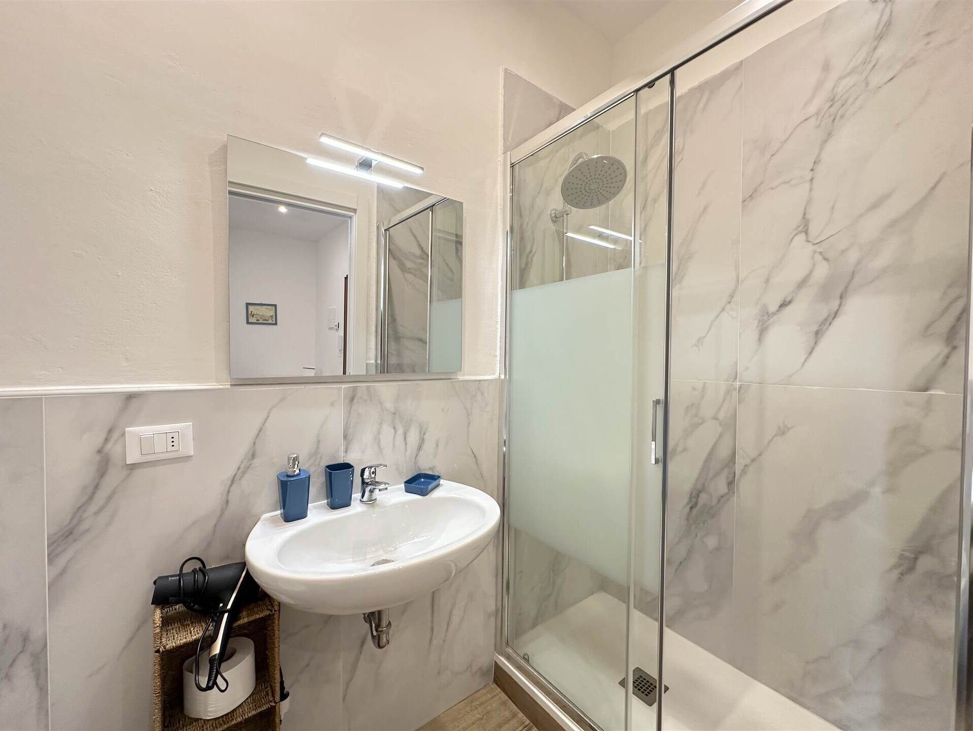 Hair dryer, bidet, towels, soap