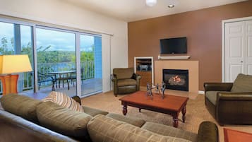 Televisión, chimenea y estéreo