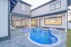 Outdoor pool, a heated pool - Spacious 10-bedroom house with carriage. Pool and spa with Deeded beach access! (Santa Rosa Beach)